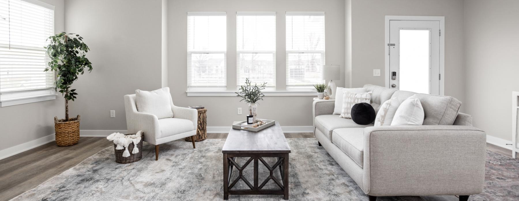 a living room with a couch and a coffee table