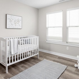 Generous bedroom offerings to fit every family a baby crib in a room